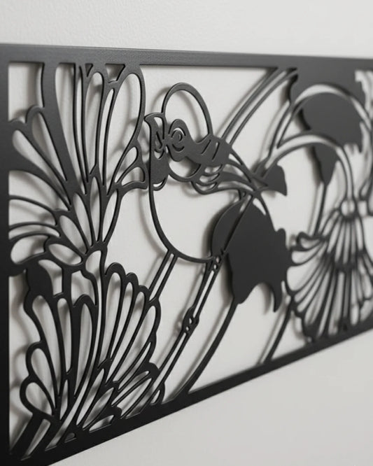 Decorative metal screen with floral and bird design on a white background