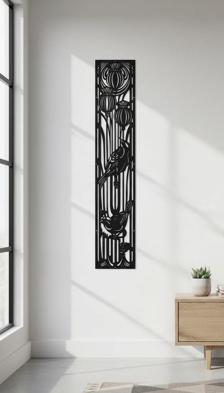 Decorative black metal wall art panel on a white wall with natural light.