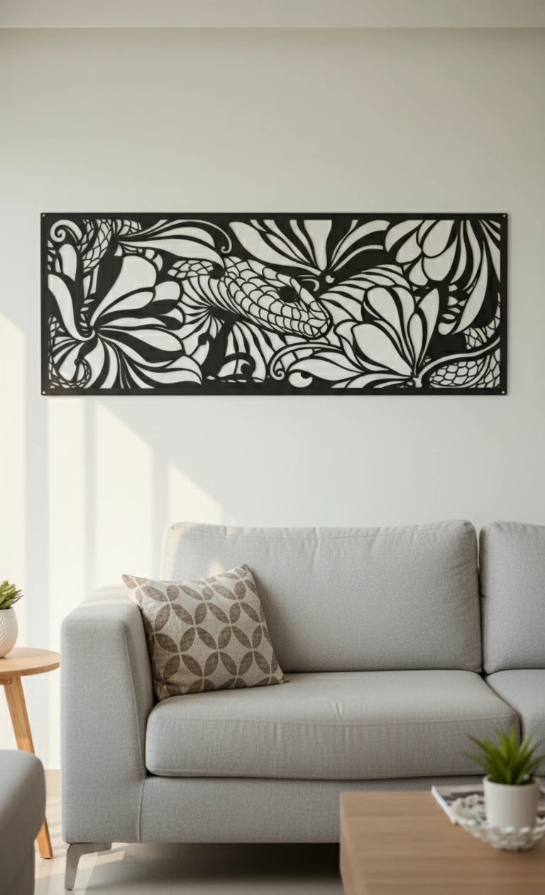 Decorative snake wall art above a gray sofa in a living room.