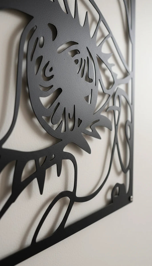 Decorative metal wall art with intricate cut-out design on a plain background