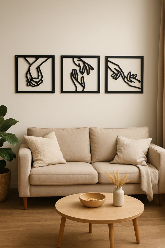 Living room with beige sofa, wooden coffee table, and wall art of hands