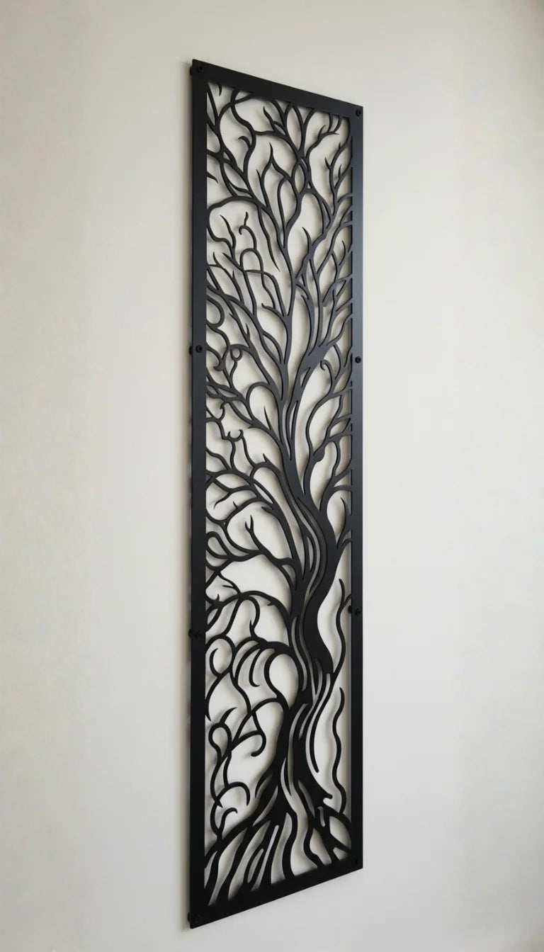 Decorative metal panel with tree design on a plain wall