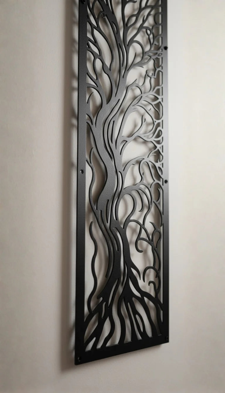 Decorative metal panel with intricate cut-out design on a plain wall.