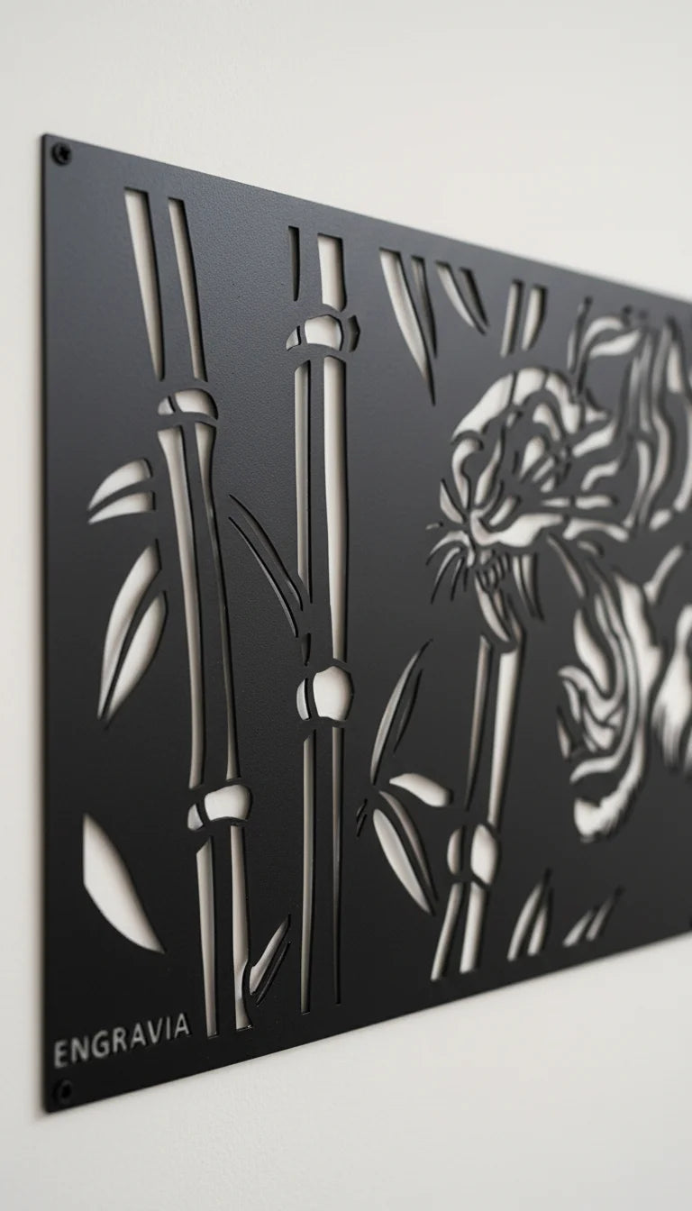 Decorative metal panel with engraved tiger and bamboo design on a white background