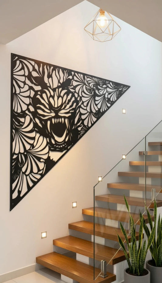 Decorative metal wall art of a tiger in a modern interior setting with stairs and plants.