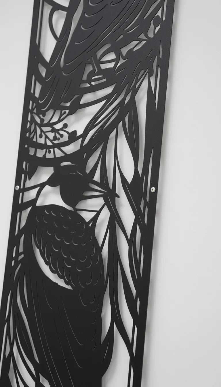 Black cutout of a bird design on a white background