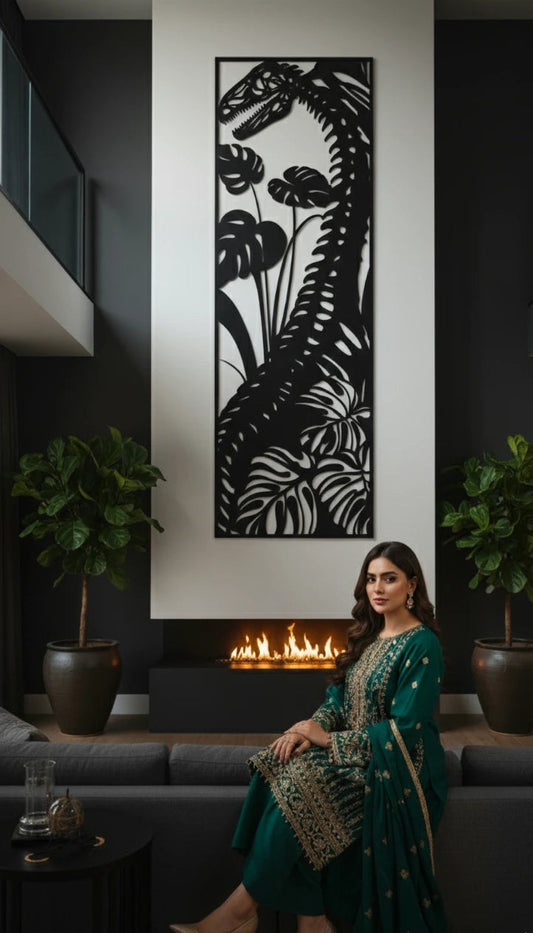 Woman in a green traditional outfit sitting in a modern living room with decorative wall art and plants.